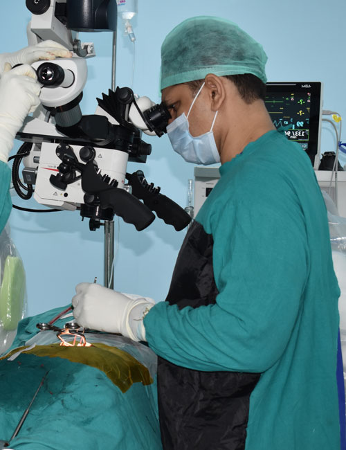 Doctor using microscope